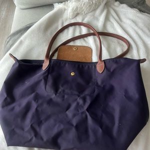 LongChamp Dark Purple - great quality classic look. The bag has been worn!